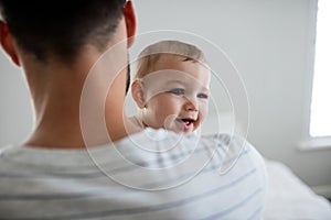 Father holding his baby girl