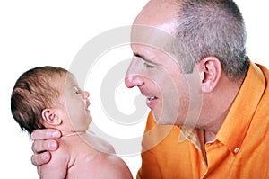 Father holding his precious newborn child