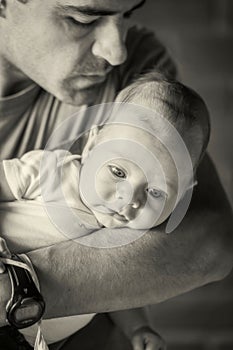 Father Holding Newborn Baby Boy