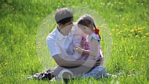 Father hugging daughter