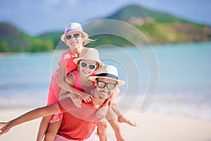 Father and kids enjoying beach summer vacation