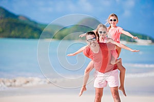 Father and kids enjoying beach summer vacation