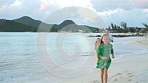 Father and kids enjoying beach summer vacation