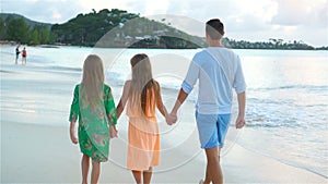 Father and kids enjoying beach summer vacation