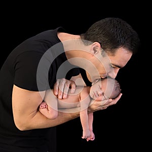 Father kissing his baby