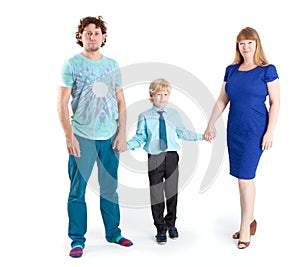 Father and mother with son a schooler looking at camera, isolated white background