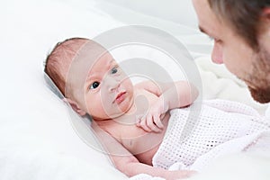 Father and newborn photo