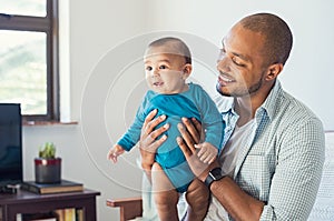 Father playing with baby