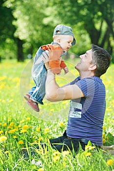 Father playing with child boy