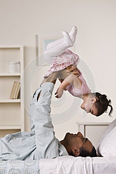Father Playing with Daughter