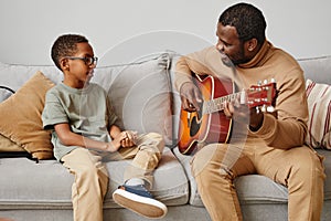 Father Playing Guitar for Son
