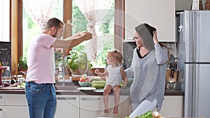 Father preparing breakfast in the kitchen. Slow motion