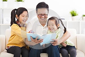 father read the book to children