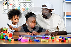 Father is Reading a Book to The Child. The Father is Helping The Child Develop Their Language Skills and Imagination. Father