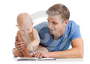 Father reading a book to son baby