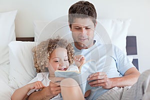 Father reading a story for child
