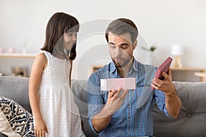 Father receive from daughter surprise pink gift box