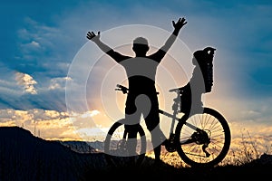 Father riding a bike with family members