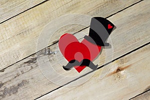 Father`s Day background. Black hat, mustache and red heart.