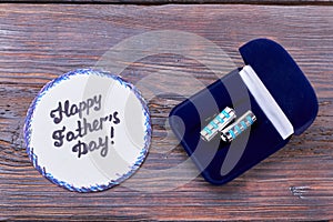 Father`s Day card and cufflinks.