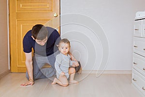 Father`s day concept - Happy family father and baby child son indoors