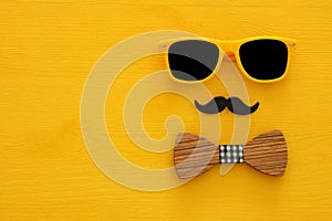 Father& x27;s day concept. Hipster yellow sunglasses and funny moustache