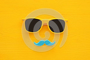 Father& x27;s day concept. Hipster yellow sunglasses and funny moustache