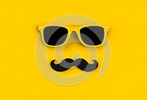 Father`s day concept. Hipster yellow sunglasses and funny moustache on yellow background
