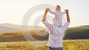 Father`s day. Happy family father and toddler son playing and l