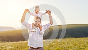Father`s day. Happy family father and toddler son playing and l