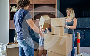 Father and son assembling moving box