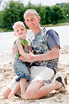 Father and son on the beach