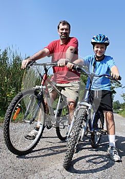 Father and son biking