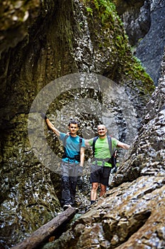 Father and son in a canyon