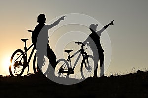 father and son chasing new routes and having a great time on bike trips