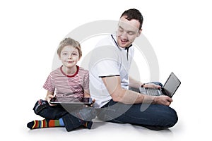 Father and son with the computer.