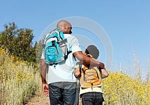 Father and son on country hike