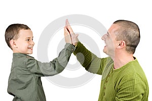 Father and son doing a high five