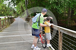 Father and son exploring nature