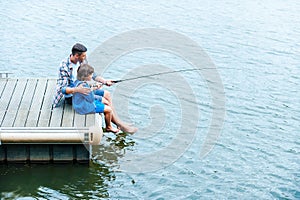 Father and son fishing.