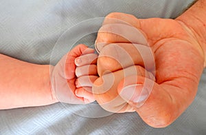 Father and son fist bump