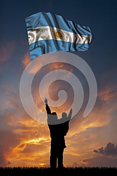 Father with son and the flag of Argentina