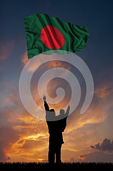 Father with son and the flag of Bangladesh