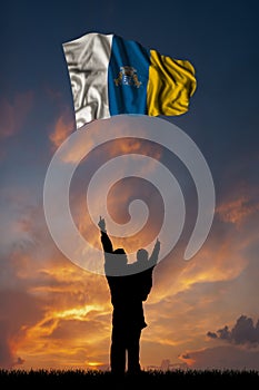 Father with son and the flag of Canary Islands