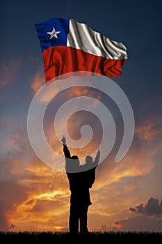 Father with son and the flag of Chile