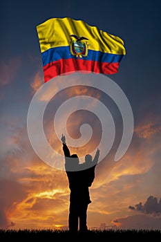 Father with son and the flag of Ecuador