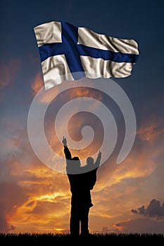 Father with son and the flag of Finland