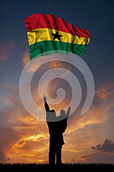 Father with son and the flag of Ghana