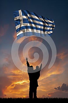 Father with son and the flag of Greece