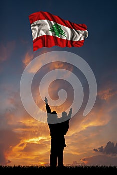 Father with son and the flag of Lebanon